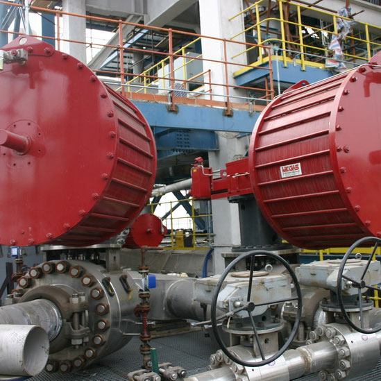 An automated Class 2500 14-inch severe service metal-seated ball valve in service isolating high pressure and hot hydrogen catalyst.